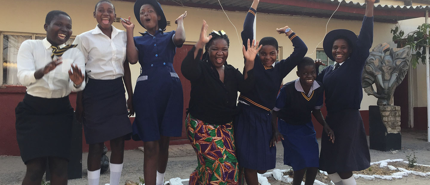 Hero_-_Angeline_and_Secondary_Scholars_jumping_ZIM_Nick_Kristof_HIP_Update