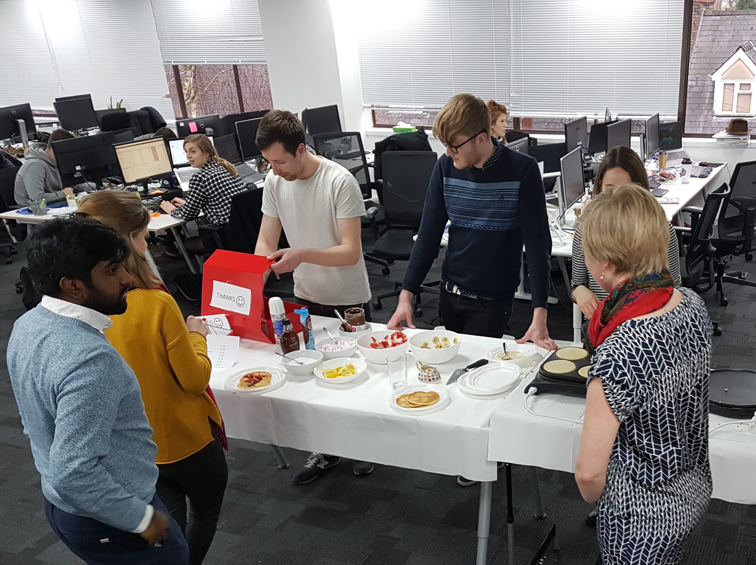 Office staff at Genie fundraise for CAMFED by holding a pancake sale