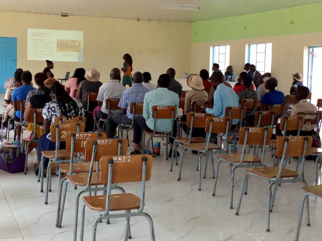 Yvonne Chari making a presentation at the 2023 Annual General Meeting for CAMFED District Committees in Zimbabwe