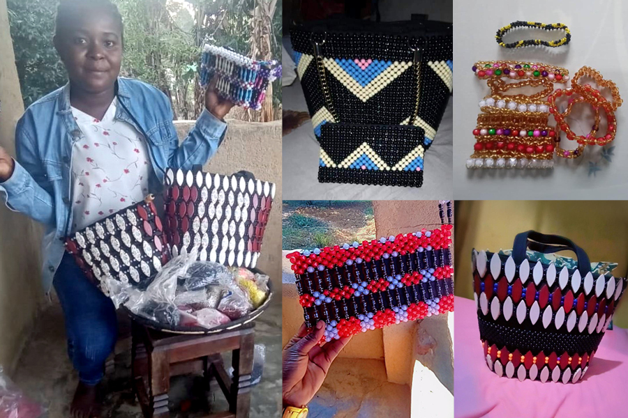 Lidya, a Tanzanian woman holds a selection of her artisan beaded bags and accessories, with a range of designs.