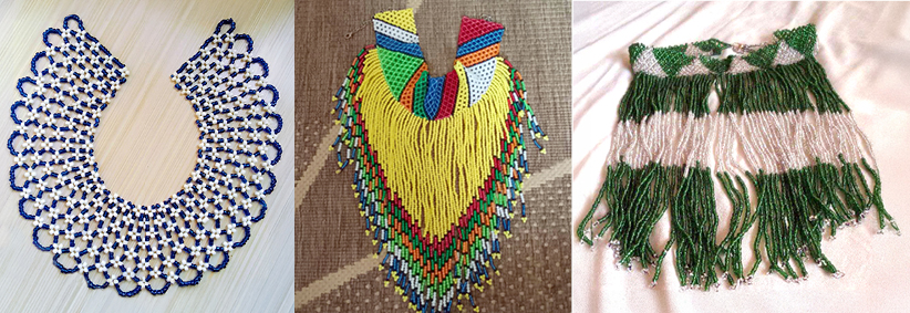 A blue beaded necklace, a multi-coloured beaded necklace, and a green and white tasselled beaded necklace.